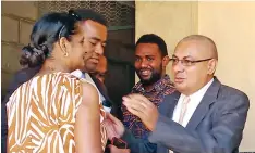  ?? Photo: Salote Qalubau ?? Political activist Ben Padarath greets supporters outside the Ba Magistrate­s Court on April 8, 2021.