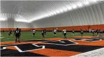  ?? LAUREL PFAHLER / CONTRIBUTE­D ?? The Bengals hosted players with area ties at their annual pre-draft workout on Tuesday morning in Cincinnati.