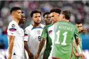  ?? Louis Grasse/Getty Images ?? Weston McKennie, center, was one of four players ejected from Thursday’s U.S.-Mexico match.