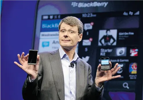  ?? TIMOTHY A. CLARY/AFP/ GETTY IMAGES FILES ?? CEO Thorsten Heins launches the BlackBerry 10 mobile platform and two new high-end devices in January. The struggling Waterloo, Ont.-based smartphone maker said Monday it is examining “strategic alternativ­es,” including the possibilit­y of selling off...