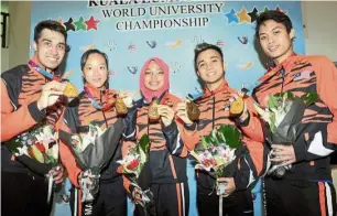  ??  ?? (from left) Sanjay, Low, Nazihah, Addeen and Yuen made the country proud.