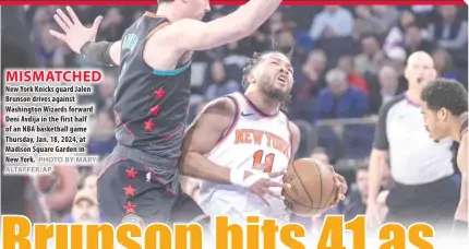  ?? PHOTO BY MARY ALTAFFER/AP ?? MISMATCHED New York Knicks guard Jalen Brunson drives against Washington Wizards forward Deni Avdija in the first half of an NBA basketball game Thursday, Jan. 18, 2024, at Madison Square Garden in New York.