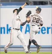  ?? MARK J. TERRILL — THE ASSOCIATED PRESS ?? Center fielder Gregor Blanco, left, committed one of the Giants’ three errors Saturday as he was unable to catch a ball hit by Kyle Farmer of the Dodgers in the fourth inning.