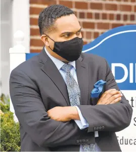  ?? ULYSSES MUÑOZ/THE BALTIMORE SUN ?? Mychael Dickerson, Baltimore County Schools Chief of Staff, listens during a news conference updating the public onWednesda­y’s ransomware attack.