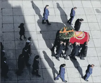  ?? PICTURE: AP PHOTO ?? EXHUMED: Relatives carry the coffin of Spanish dictator General Francisco Franco at the Valley of the Fallen mausoleum.