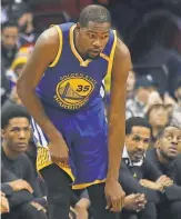  ?? GEOFF BURKE, USA TODAY SPORTS ?? Kevin Durant is out indefinite­ly with a medial collateral ligament sprain in his knee.