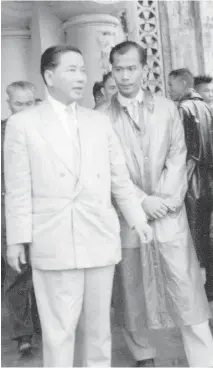  ?? OTTAWA CITIZEN ?? Ton That Thien, right, with Vietnam’s then-president Ngo Dinh Diem in 1958 when Thien was the president’s press secretary. Thien was present at many historical events in Vietnam’s political history.