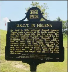  ??  ?? At the Fort Curtis facsimile, a sign salutes Black soldiers in the Union army.