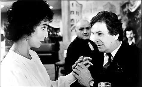  ?? MGM ?? Cher and Danny Aiello in “Moonstruck,” directed by Norman Jewison.