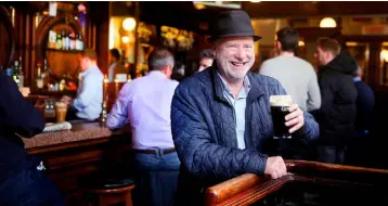  ?? Photo: David Conachy ?? SUPPING WITH JOY: Liam Collins in The Swan on Aungier Street, Dublin.