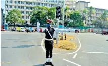  ??  ?? A Military Police personnel doing the Traffic Police job