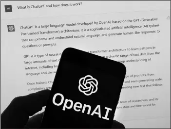  ?? MICHAEL DWYER / ASSOCIATED PRESS FILE ?? The Openai logo is seen on a mobile phone in front of a computer screen which displays output from CHATGPT on March 21 in Boston. As schools across the country debate banning AI chatbots this year, some math and computer science teachers are embracing them as another tool.