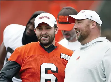  ?? RON SCHWANE — THE ASSOCIATED PRESS ?? FILE - In this June 4, 2019, file photo, Cleveland Browns quarterbac­k Baker Mayfield (6) talks with head coach Freddie Kitchens at the team’s training facility in Berea, Ohio.