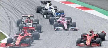  ?? AFP ?? Ferrari drivers Sebastian Vettel, right, and Charles Leclerc, left, during the Styrian Grand Prix.