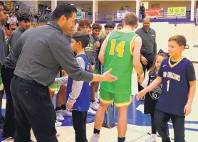  ?? COURTESY OF SHANNON STEVEN ARAGON ?? Arthur Gonzales, left, is taking over as the new Pecos boys head basketball coach.