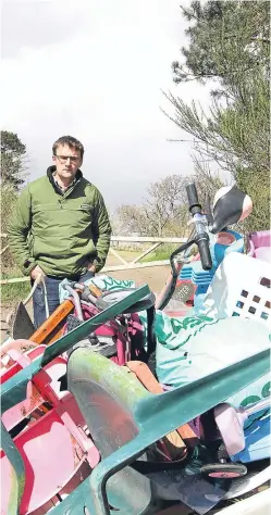  ?? Picture: Gareth Jennings. ?? Farmer Tom Pate with rubbish which was dumped on Emmock Road,Dundee, outside the gate to one of his fields.