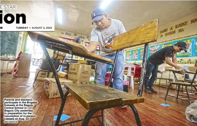  ?? ANDY ZAPATA JR. ?? Parents and teachers participat­e in the Brigada Eskwela at the Baguio Central School in Baguio City yesterday in preparatio­n for the resumption of in-person classes on Aug. 22.