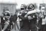  ?? Evan L'roy/contributo­r ?? Players for the Smithson Valley Rangers react after their loss to the College Station Cougars at the Pfield stadium in Pflugervil­le on Saturday.