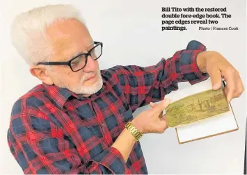  ?? Photo / Frances Cook ?? Bill Tito with the restored double fore-edge book. The page edges reveal two paintings.