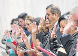  ?? ERNESTO CARRANZA/THE GUARDIAN ?? A Dec. 17, 2019, citizenshi­p ceremony at the Confederat­ion Centre of the Arts in Charlottet­own welcomed 70 new Canadians.