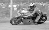  ??  ?? Above: Phil Read was a bit of a lucky winner, as his MV was not 100% fit and two of his main rivals crashed out of the race.
Right: The fantastic style of a small guy on a huge bike. Flying Finn Tepi Länsivuori on the works Yamaha. He won the 350 and...