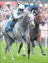  ?? ?? Alpinista (left) wins the Yorkshire Oaks in August