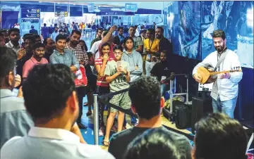  ??  ?? Artist Omar Hamdan performs using Buzuq instrument as part of Dubai Metro Music Festival at Bur Juman Metro station in Dubai on Mar 20. While performing artists and entertaine­rs in western public transport stations are common, it is unusual in Dubai where commuters can be fined for drinking water or chewing gum on the train. — AFP photos