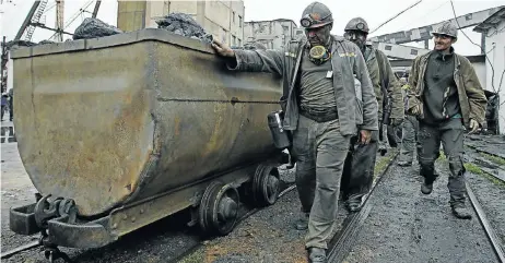  ?? Picture: REUTERS ?? MARGINS: Miners at Kholodnaya Balka coal mine in Makeyevka, Ukraine. Analysts say the industry will come under renewed pressure next year