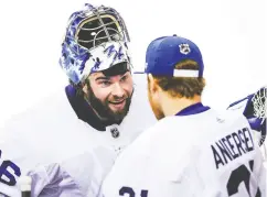  ?? DEREK LEUNG / GETTY IMAGES ?? Jack Campbell, left, likely won’t suit up Tuesday, while Leafs goaltendin­g partner Frederik Andersen gets the
start. Backup duties will go to Michael Hutchinson.