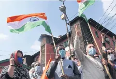  ?? AFP ?? Bhartiya Jhanata Party supporters protest to demand better security after suspected militants shot dead five soldiers in Kashmir in Srinagar on Tuesday.