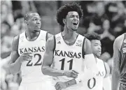  ?? [AP PHOTO] ?? Kansas guard Josh Jackson celebrates a basket on Sunday in Tulsa. The drips and dribbles of unsavory news that have followed Kansas all season seems to have stopped, at least for the moment.