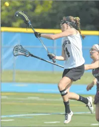  ?? TIM COOK/ THE DAY ?? Stonington senior Emily Cassata scores a goal with 3:48 remaining, one of five straight to end the game and lift the Bears to a 13-10 win over Granby on Saturday in the CIAC Class S state girls’ lacrosse title game at Bunnell High in Stratford. Cassata...