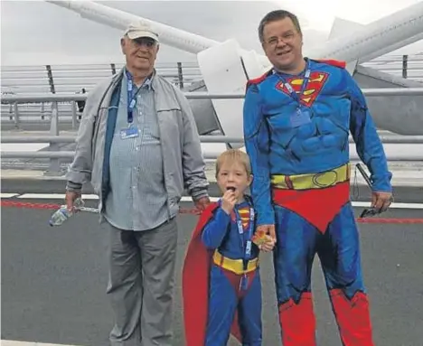  ??  ?? YOUNG Ryan Hamilton from Dundee turned Superman to raise charity cash.
The five-year-old from Kirkton, a P1 pupil at Sidlaw View, walked over the new Queensferr­y Crossing yesterday.
He was joined by his dad Robert, a 45-year-old labourer, who was...