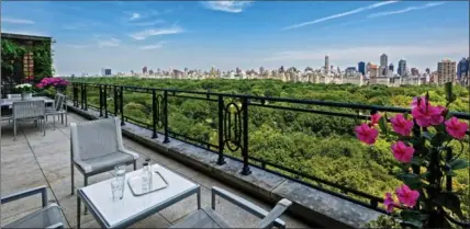  ?? ANDREW KIRACOFE, TNS ?? Sting’s penthouse duplex occupies two stories overlookin­g New York City’s Central Park. The two levels of the Manhattan home are connected by an elevator and two staircases.