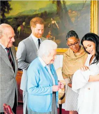  ?? Photo / AP ?? The Queen meets great-grandson Archie Mountbatte­n-Windsor.