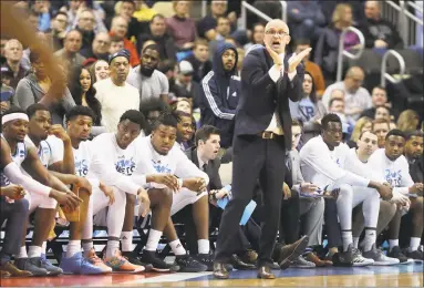  ?? Rob Carr / Getty Images ?? ...current Rhode Island coach Danny Hurley.