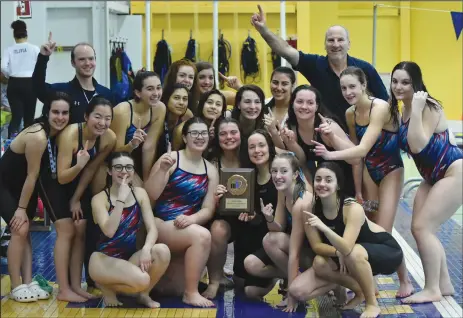  ?? Submitted photo courtesy of Kim Pierce ?? With head coach Tom DiIorio, raising his index finger high in the air while standing far right, the Lincoln High School girls swimming team celebrates winning the RIIL Division II Championsh­ip at Roger Williams University on Saturday.