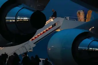  ?? GETTy imAgEs ?? BACK TO BASE: President Biden steps off Air Force One at Joint Base Andrews after returning Wednesday from Pittsburgh, where he detailed his $2 trillion plan to grow jobs, repair infrastruc­ture and raise corporate taxes.