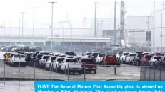  ??  ?? FLINT: The General Motors Flint Assembly plant is viewed on Monday in Flint, Michigan. This plant produces Heavy-Duty Chevrolet and GMC Sierra Crew and Regular Cab Trucks. – AFP