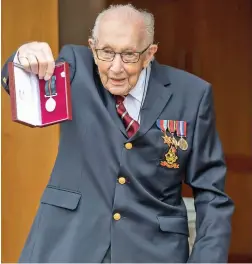  ??  ?? Captain Tom Moore, a former British Army Officer, has been promoted to the rank of Colonel on his 100th Birthday by the Queen after he raised £29 million (FJ$80.61m) for the NHS amid the coronaviru­s pandemic.