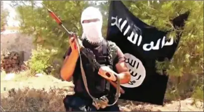  ??  ?? A still from a video posted by an “American mujahid”. Thousands of Western jihadis have converged on Syria