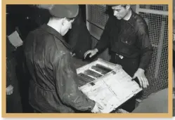  ??  ?? INSET Workers open crates of Reichsbank gold bars hidden at Heilbronn