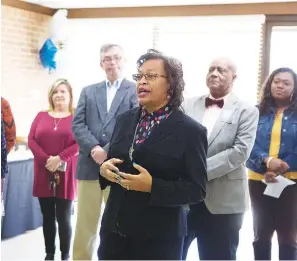  ?? (Submitted photo) ?? Barbara Pitts Riley, center, will receive the Black Excellence Award during the second annual Black History Celebratio­n on Thursday at Ozan Inghram Iron Mountain Neighborho­od Center, 1101 Couch St. Riley, who operates the Sandflat-Glendale-Shannon Neighborho­od Center, is a longtime community worker. The celebratio­n is hosted by Pillars & Plants.