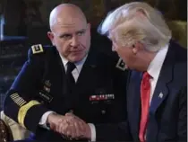  ?? SUSAN WALSH, THE ASSOCIATED PRESS ?? U.S. President Donald Trump, right, shakes hands Monday with Army Lt. Gen. H.R. McMaster at Trump’s Mar-a-Lago estate in Palm Beach, Fla.