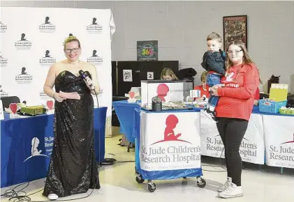  ?? Lara Green-Kazlauskas/Hearst Connecticu­t Media ?? The 44th Tim Driscoll St. Jude Children’s Research Hospital Telethon was held Sunday at Torrington High School. The annual event has raised thousands each year with live entertainm­ent, food and a prize table. Kolbe Driscoll, left, emcees during the telethon.