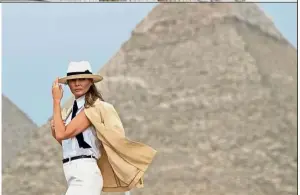  ?? — AFP ?? On a mission: Melania posing with the pyramids at Giza as a backdrop in Egypt.