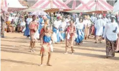  ??  ?? Young girls from Amukwa village dance at the arena