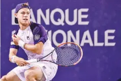  ??  ?? Diego Schwartzma­n of Argentina hits a return against Dominic Thiem of Austria during day five of the Rogers Cup presented by National Bank at Uniprix Stadium on August 8, 2017 in Montreal, Quebec, Canada. - AFP photo