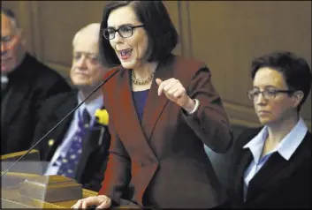  ??  ?? Oregon Gov. Kate Brown lobbied for the gun control bill the state passed Thursday and said she will sign it. Don Ryan The Associated Press