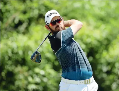  ?? AFP ?? Louis Oosthuizen ends a 33-month winless run by lifting the South African Open. —